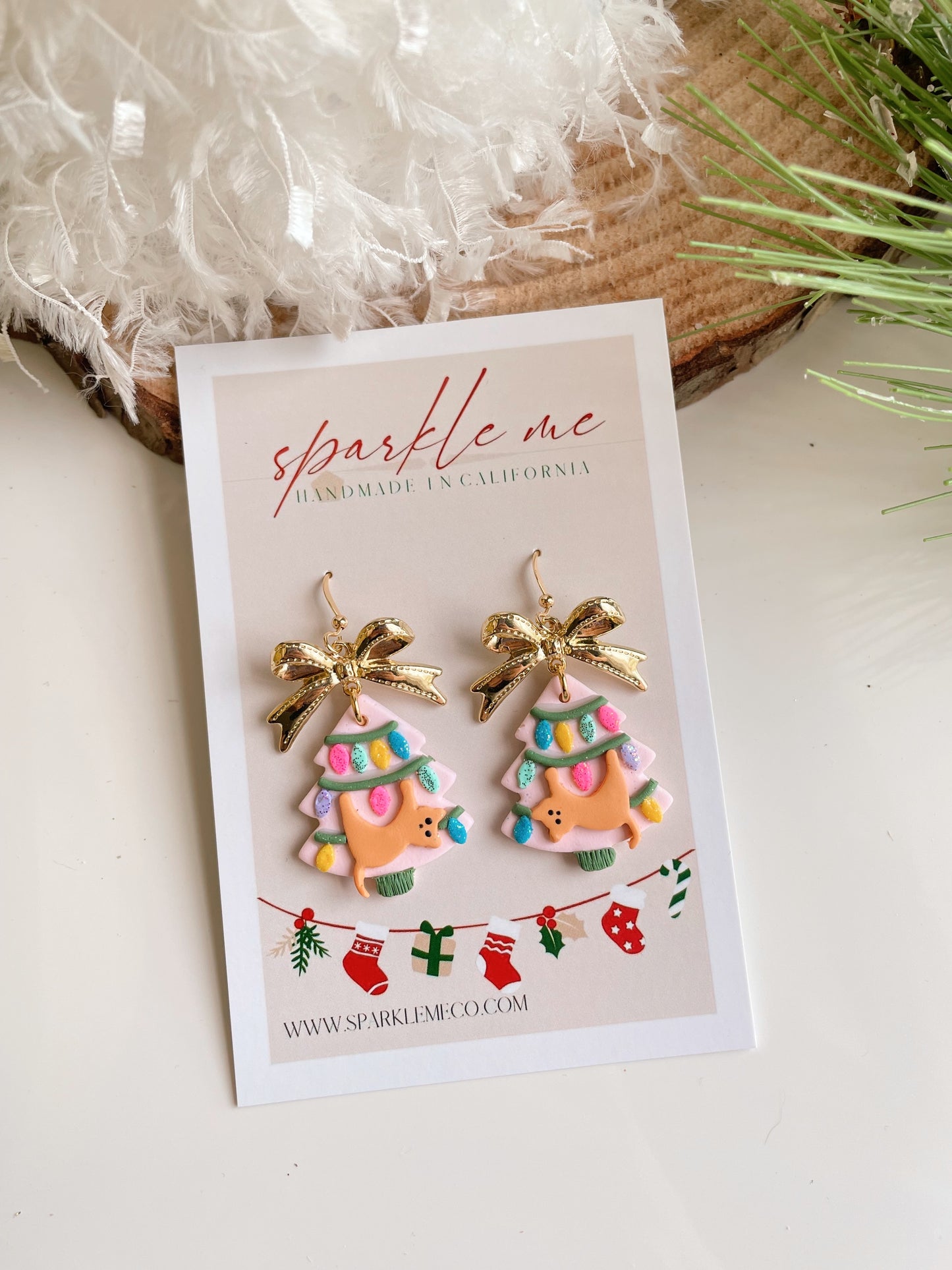 Orange Cat On Tree Dangles